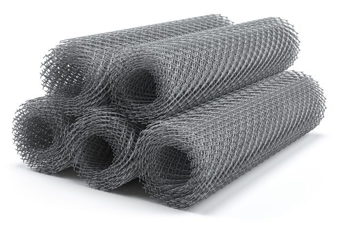 Coils of steel wire. Rabitz mesh netting rolls isolated on white. 3d illustration